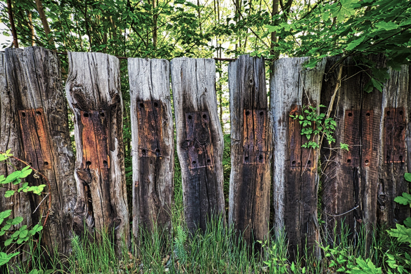 Old railway sleepers have been reused in many ways, such as here in the form of a fence.