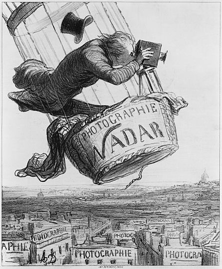 Nadar (Félix Tournachon; 1820-1910), the first person to take aerial photographs, portrayed while  photographing Paris from a balloon. 