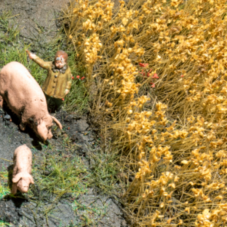 Diorama mit Schweinen am Feldrand