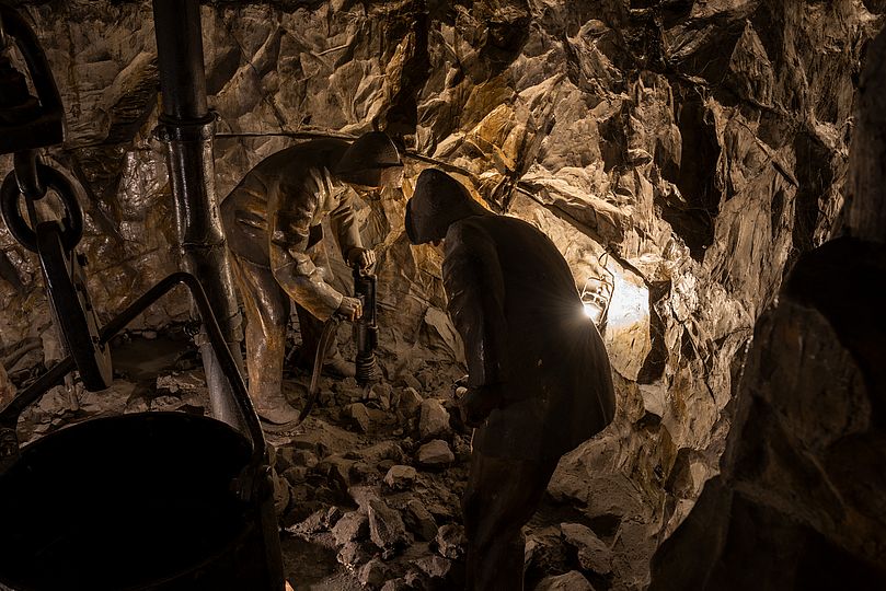 Sinking a shaft in a hard rock mass.