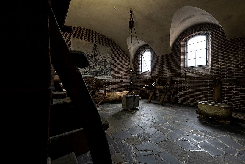 Reconstruction of a room with early mechanical tools.