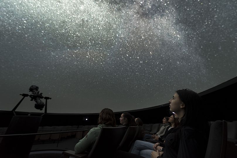 Visitors in the planetarium.